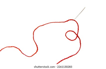 Red thread isolate on white background. Selective focus. Old.