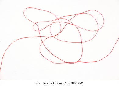 red thread isolated on white background