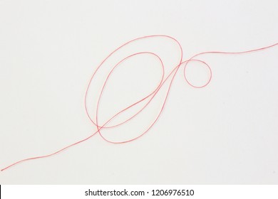 Red Thread Isolated On White Background