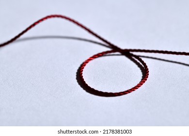 Red Thread Isolated On White Background