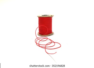  Red Thread On The White Background