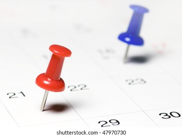 Red Thumb Tack On Calendar Page