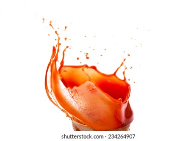 Red Tomato Juice Splash Isolated On White Background