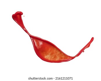 Ketchup de tomate rojo salpicado en fondo blanco