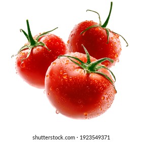 Red tomatoes levitate on a white background