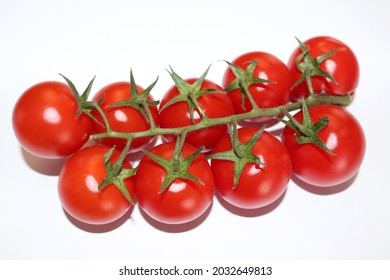 Red tomatoes on a stork