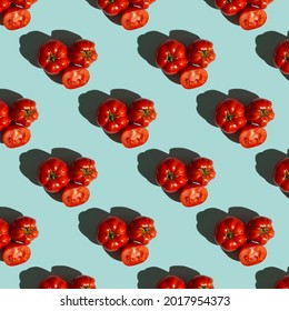 Red Tomatoes Pattern On A Blue Background, Flat Lay. Tomato Wallpaper, Vegetable Pattern, Pop Art Composition.Top View. 