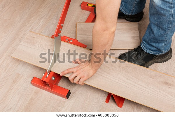 Red Tool Cutting Laminate On Laminate Stock Photo Edit Now