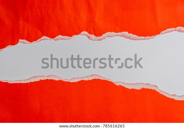 red torn paper with\
edges on white paper and text copy space. Using idea design\
background or wallpaper.
