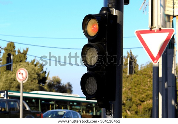 Red traffic light, city\
traffic