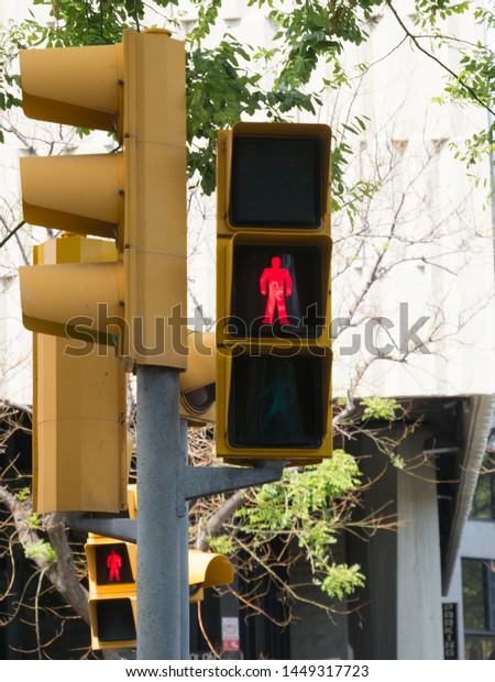 Red traffic light at a pedestrian crossing.\
Barcelona, Spain.
