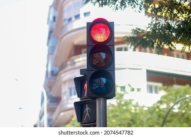 Red traffic lights in the streets of Spain
