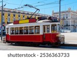 Red tram in the city. Traditional vintage red tram in Lisbon, Portugal