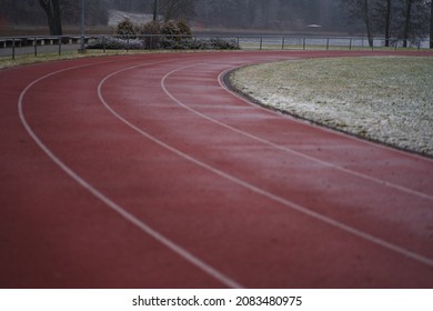 Red treadmill on sport field. Running track on the stadium - Shutterstock ID 2083480975