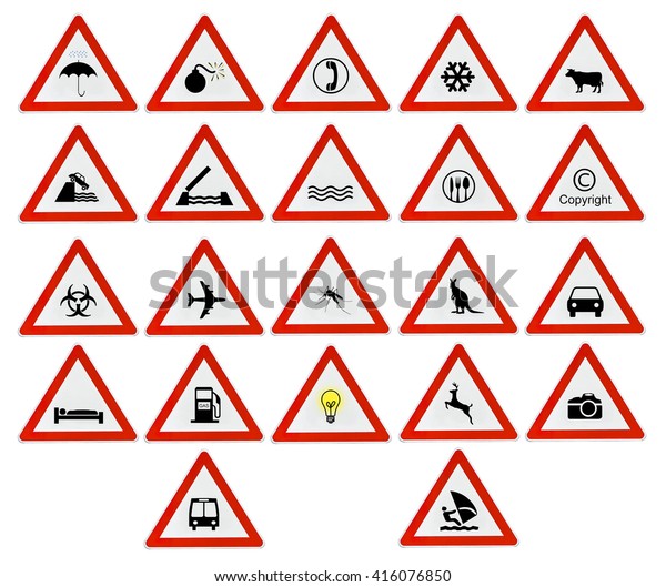 Lot red triangle\
attention road sign