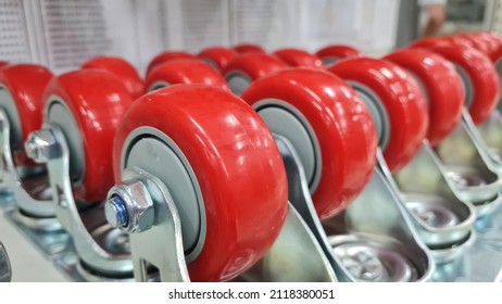 Red Trolley Wheel, Rotary Wheel On Shop Shelf