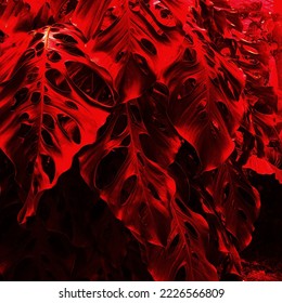 red tropical leaf background, trending color concept of the year 2022 Very peri.