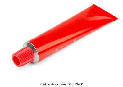 Red tube of ointment isolated on white
