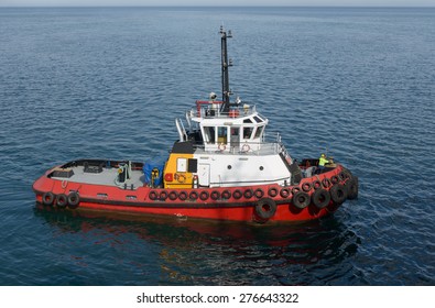 Red Tug Boat On The Water