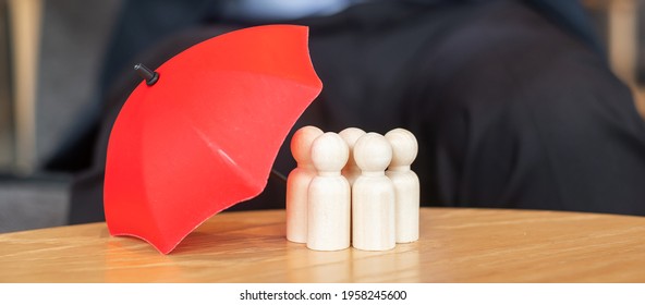 red umbrella cover man wooden from crowd of employees. People, Business, Human resource management, Life Insurance and Teamwork Concepts - Shutterstock ID 1958245600
