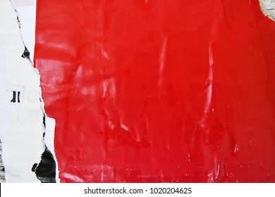 Red Urban Poster Texture, Street Poster That Has Been Torn  