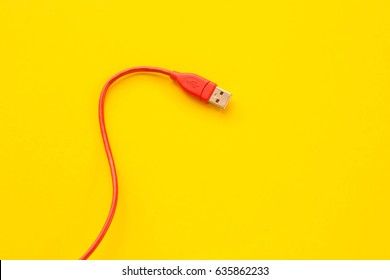 Red Usb Cable On Yellow Background