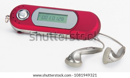 Red USB MP3 player with silver earphones, isolated on white background