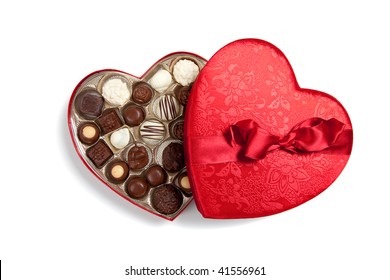 Red Valentine Heart Filled With Chocolates On A White Background