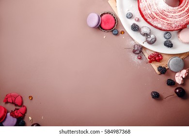 Red Velvet Cake With Berries And Macarons. Top View, Copy Space.