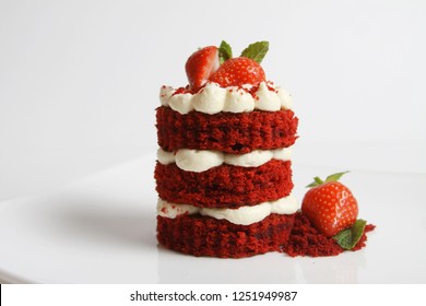 Red Velvet Cake With Strawberry, Cream Cheese On White Plate And Background