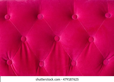 Red Velvet Couch Background Texture With Sunken Buttons