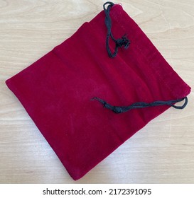 A Red Velvet Draw String Bag