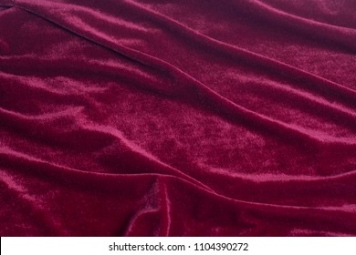 Red Velvet Fabric Background Texture.