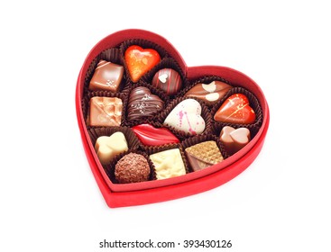 Red Velvet, Heart Shaped Box Of Chocolates. Shot On White Background.