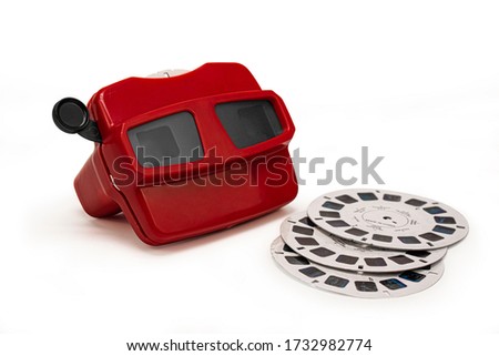 Red vintage 3D slide viewer isolated on white background. Retro style 3d slider