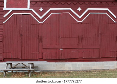 Red Vintage Barn With Picnic Bench