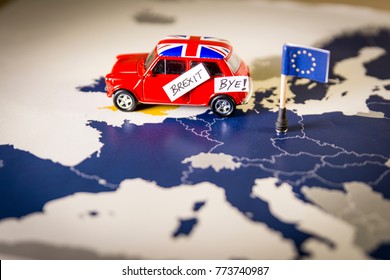Red vintage car with Union Jack flag and brexit or bye words over an UE map and flag. Symbolizing the Brexit concept.The UK is thus on course to leave the EU on 29 March 2019