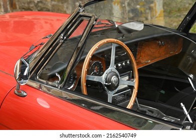 Red Vintage Sports Car With An Open Top