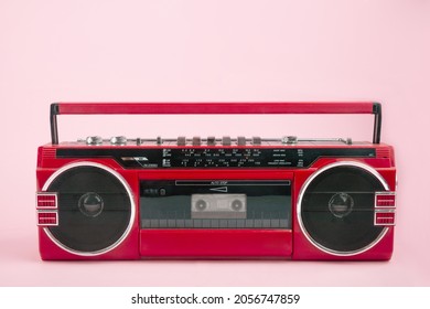 Red Vintage Tape Player Isolated On Pink Background