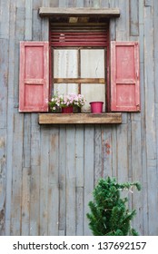 Red Vintage Window On Wooden Wall