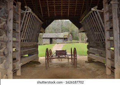 Red wagon inside vintage barn