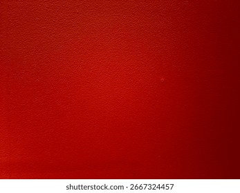 Red wall texture with rough surface detail, rustic painted background for construction, design, architecture, and decorative interior projects.