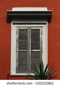 Red wall and white window