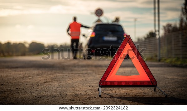 red warning\
triangle warn of car\
breakdown