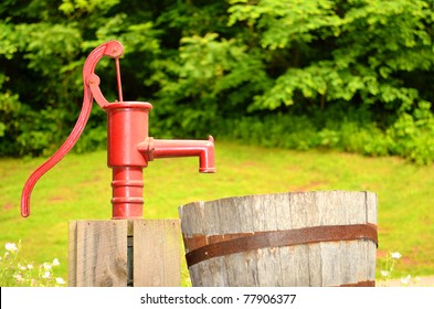 Red Water Pump In Field