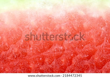Red watermelon slice closeup detail macro shot with copy space