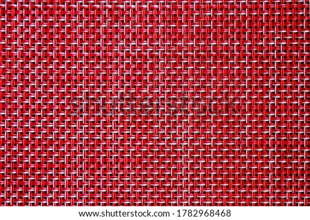 Red weave seamless texture of bamboo wicker rattan basket pattern background. Rough wooden wicker texture, red weave texture detail. Square vintage weave textile texture. Wicker fabric basket pattern