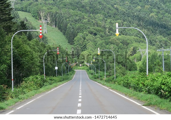Red and White arrow  , a traffic signs in Hokkaido\
Province ,Japan