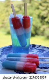 Red, White And Blue Juicy Popsicle Bomb Pops On Platter For Independence Day 