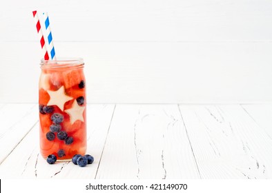 Red, White And Blue Lemonade Or Sangria. Patriotic Drink Cocktail With Watermelon, Blueberry And Apple For 4th Of July Party. Fruit Infused Water